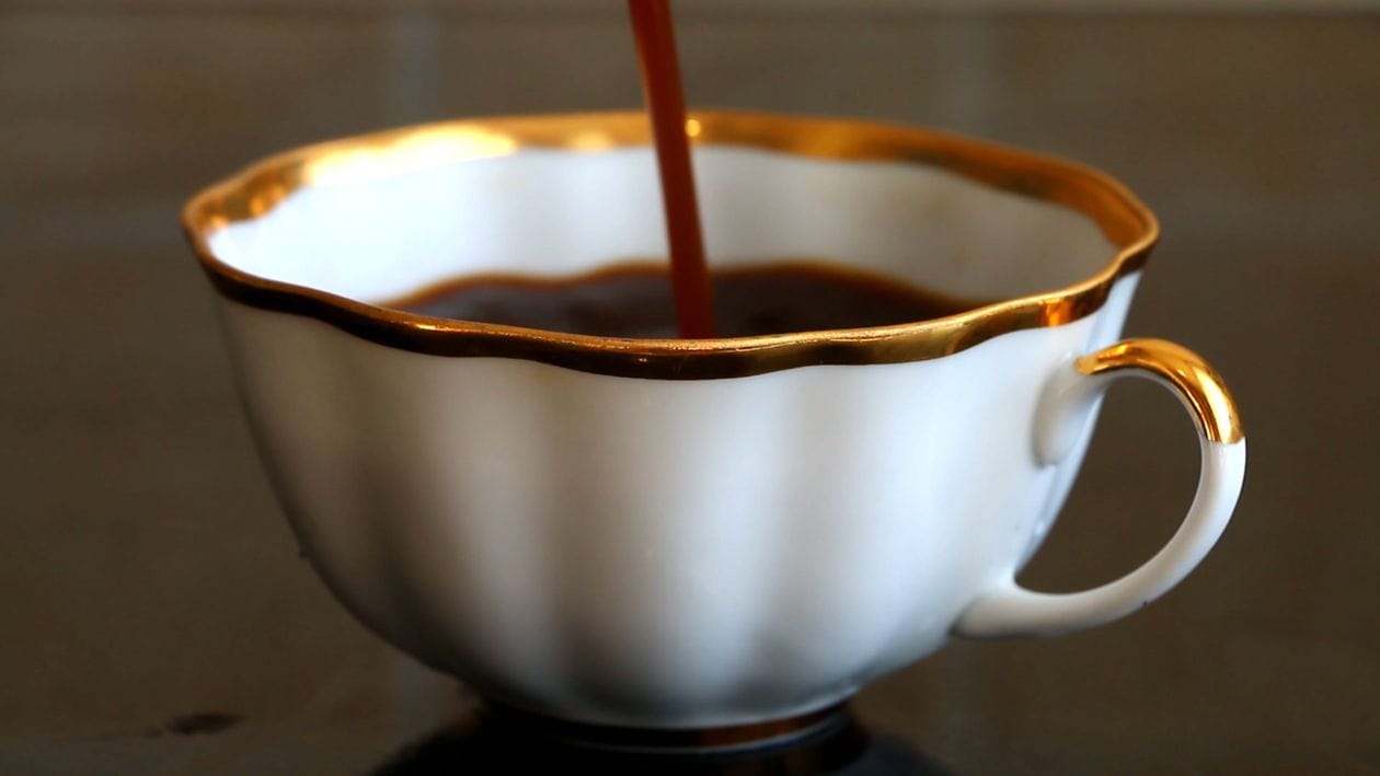Pouring into that white‑rimmed cup, watching the d — Noah on DeHub